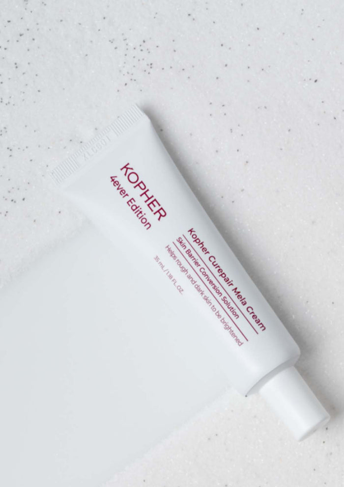 Kopher Purgepair White Cream tube on a light gray background