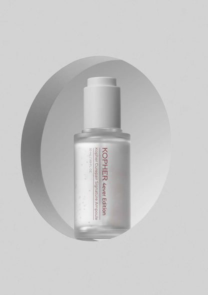 Kopher skincare serum bottle on a gray background