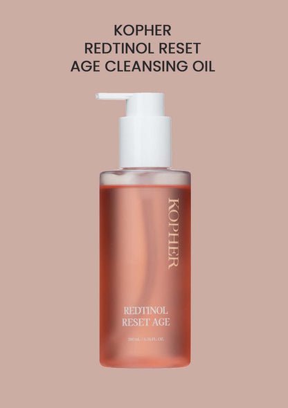 Kopher Redtinol Reset Age Cleansing Oil bottle on a beige background