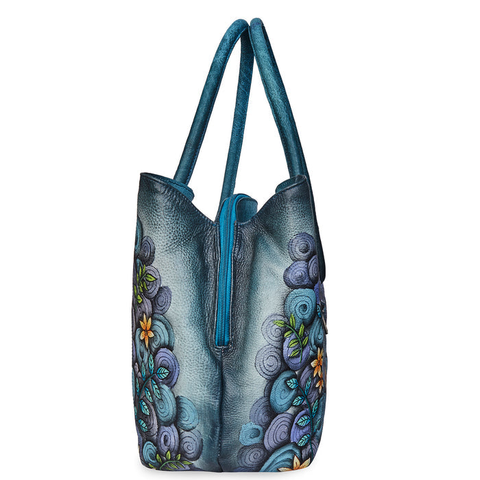 Women's hand-painted abstract leather traveler tote bag for travel-side view