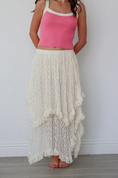 girl wearing cream lace long skirt