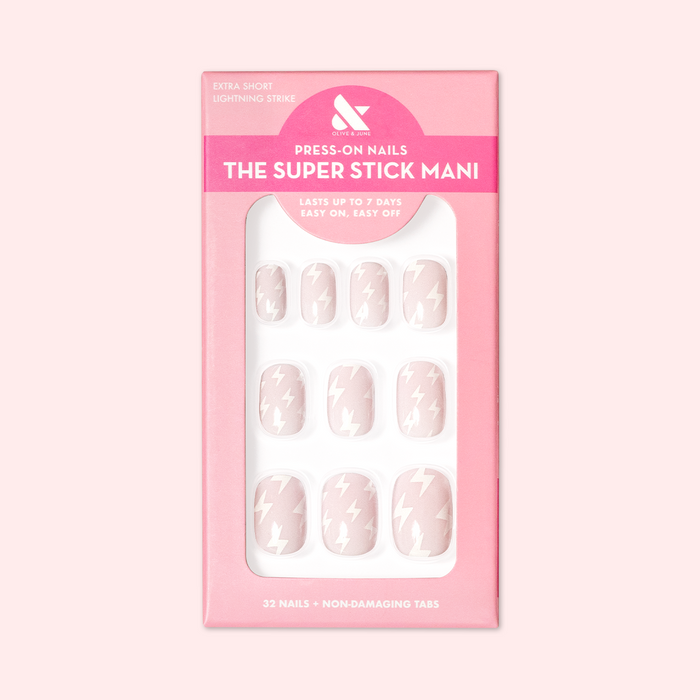 Lightning Strike | Extra Short | Squoval - Tab Press-On neutral press-on nails with minimalist white lightning bolt design in pink packaging