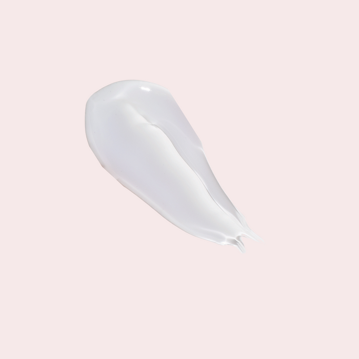 Swatch of LippEase Tinted Lip Treatments 'C-Thru’ (clear high-shine balm) showing glassy finish