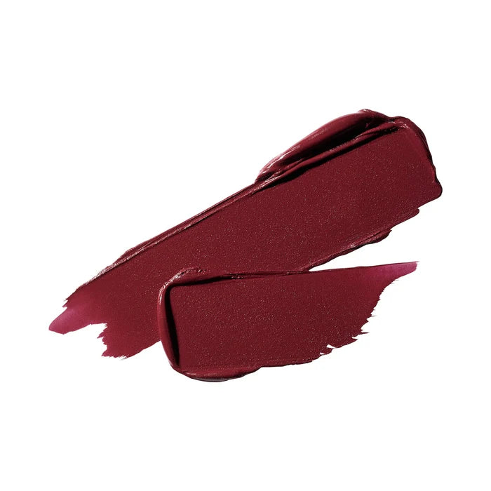 MAC M·A·Cximal Silky Matte lipstick in Diva shade, showing a reddish-burgundy bullet with a smooth matte finish