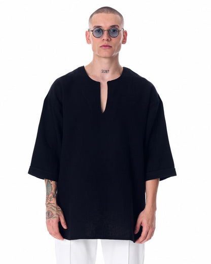 Martin Valen oversized black linen men's t‑shirt, front close view showing split neckline and mid‑length sleeves