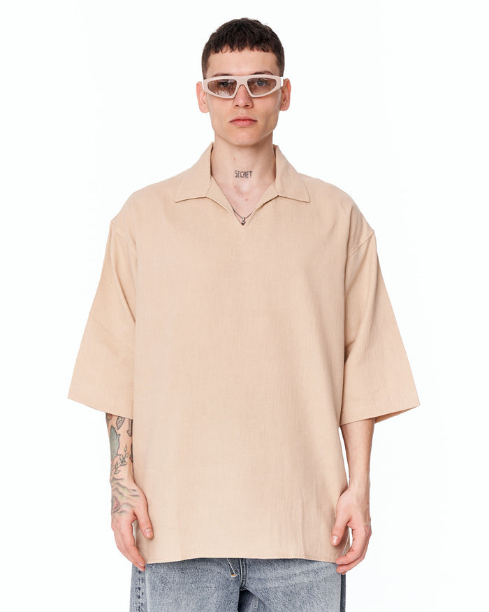 Martin Valen oversized beige linen men’s shirt, front view, V-neck collar and short wide sleeves