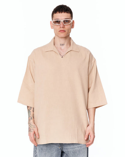 Martin Valen oversized beige linen men’s shirt, front view, V-neck collar and short wide sleeves