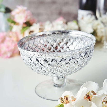 Silver glass compote bowl with intricate diamond pattern and reflective finish.