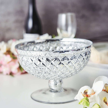 Vintage silver glass bowl with intricate design, perfect for decor or serving.