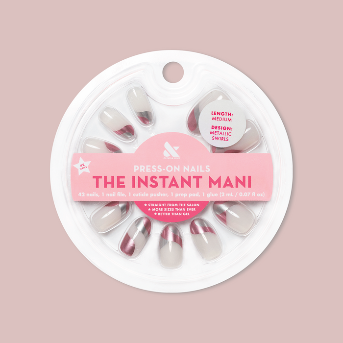 Metallic Swirls - Press-On | Medium | Oval false nails in two-tone metallic swirl design in circular packaging on soft pink background