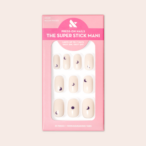Moon Phases | Short | Squoval - Tab Press-On nails with neutral base and dark moon phase designs in pink packaging