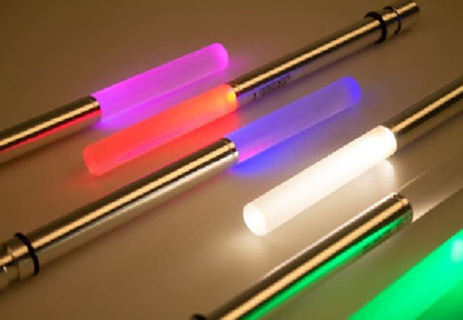 Multicolor LED bottle light wand rods glowing red, purple, green, and white