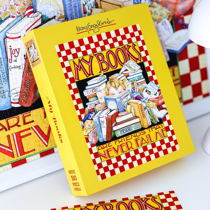Sure! Here’s a rewritten version using the provided data: The WEVE My Books 500 Piece Jigsaw Puzzle is crafted from premium blue board and features an enchanting Mary Engelbreit illustration of a person surrounded by stacks of books.