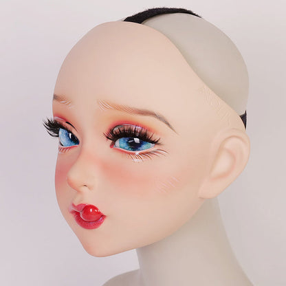 Inthemask by Moli's NEOGAN Cherrie female doll mask with pink latex hood and gag, featuring detailed facial paint and realistic design.