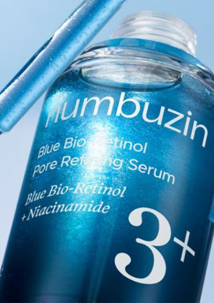 Blue Bio-Retinol Pore Refining Serum bottle with 'humbuzin' branding on a light blue background