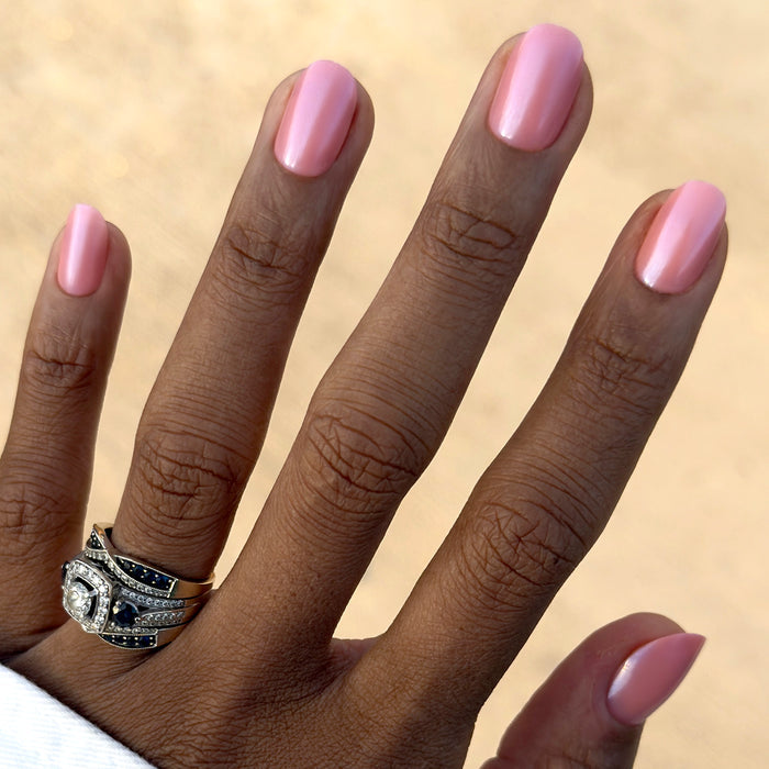 Olive Y'all | Short | Round - Tab Press-On with sheer bubble gum pink-blue iridescent nails in a quick at-home mani