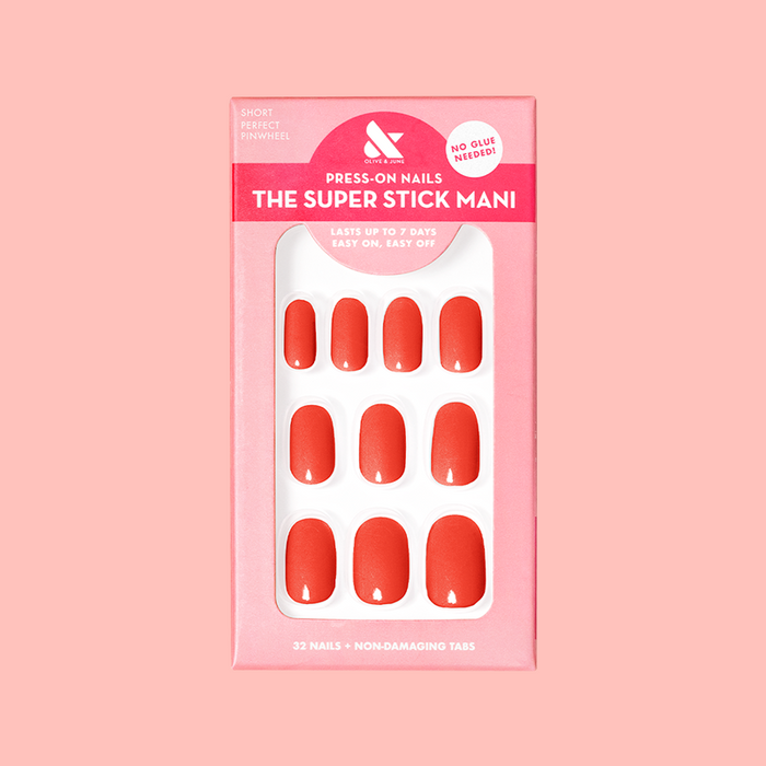 Perfect Pinwheel | Short | Round - Tab Press-On nails in cheerful coral shade for easy, long-lasting at-home manicure with tabs