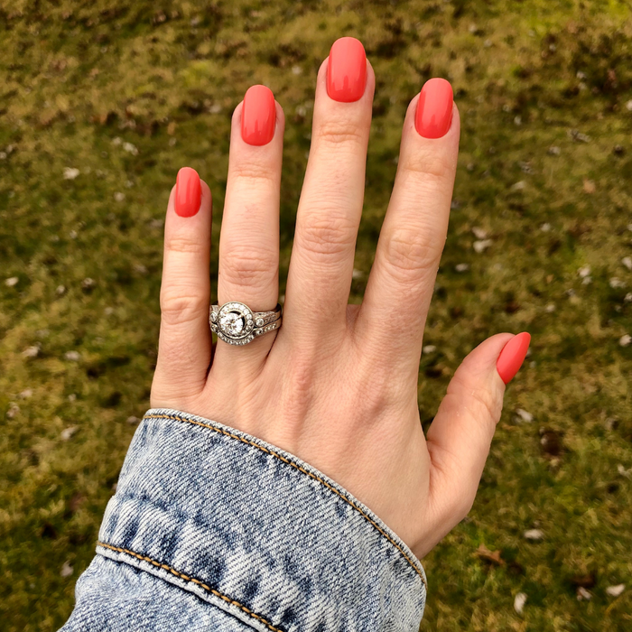 Perfect Pinwheel | Short | Round - Tab Press-On nails in vibrant coral for easy, quick at-home manicure with smooth finish
