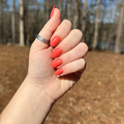 Perfect Pinwheel | Short | Round - Tab Press-On nails in vibrant coral for quick and easy at-home manicure with smooth finish