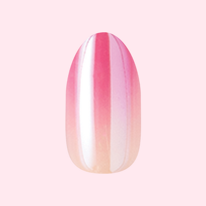 Pink Chrome Gradient | Medium | Oval - Tab Press-On showing a soft pink to peach shimmering mani in oval shape
