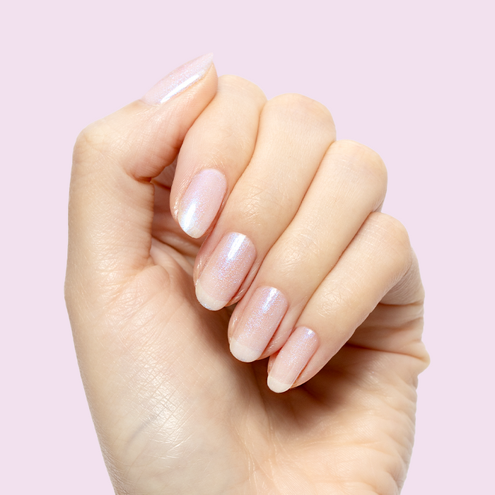 Pink Goldfish - Gel on natural nails with soft pink iridescent shimmer for a gentle manicure by Olive and June