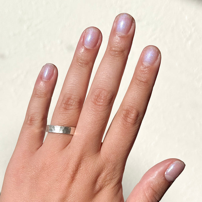 Pink Goldfish - Gel on natural nails showing soft pink iridescent shimmer for a subtle manicure by Olive and June