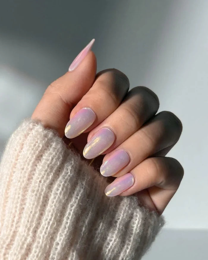 Hand with EyeCandys Pink Soda Pop Gel Nail Stickers featuring a vibrant pink glitter design. These semi-cured gel stickers offer a fun, sparkly manicure that lasts up to 2 weeks—perfect for bold, playful spring and summer nail looks with a glossy, salon-quality finish.