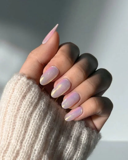 Hand with EyeCandys Pink Soda Pop Gel Nail Stickers featuring a vibrant pink glitter design. These semi-cured gel stickers offer a fun, sparkly manicure that lasts up to 2 weeks—perfect for bold, playful spring and summer nail looks with a glossy, salon-quality finish.