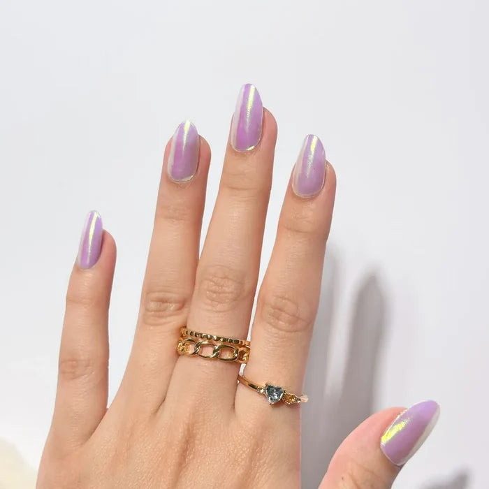 Model's hand showcasing EyeCandys Pink Soda Pop Gel Nail Stickers. These vibrant, pink-colored stickers offer a fun, chic look with a long-lasting, chip-free finish, perfect for effortless and stylish nail art.