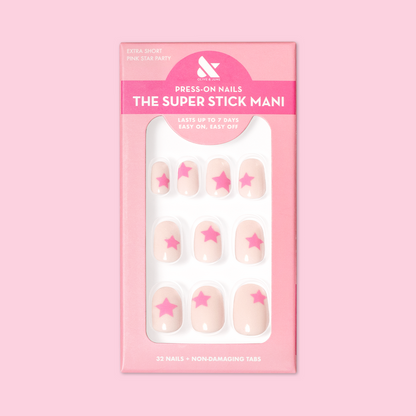 Pink Star Party | Extra Short | Round - Tab Press-On nails with tonal pink base and star designs in packaging on pink background