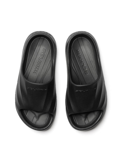 Black SELKIRK slide sandals, top view of pair
