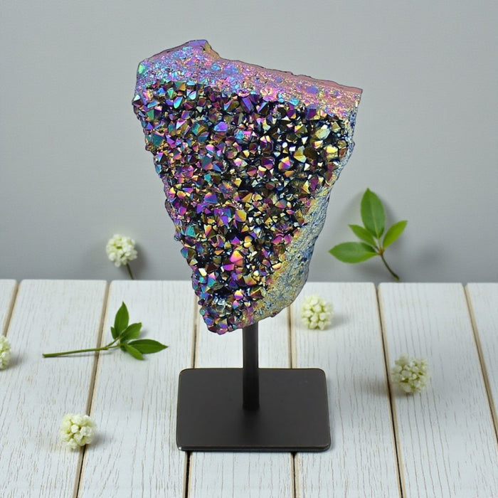 Rainbow Aura on Metal Base Stand on a stand with a gray background