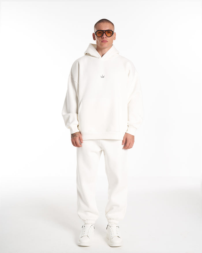 Martin Valen Regalia Crown oversized white hoodie, front view on model showing small crown logo at chest