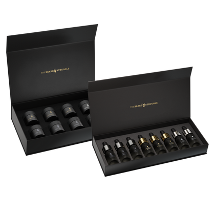 Scent Raider Sample Kit by The Beard Struggle, two open black gift boxes holding eight beard oil sample bottles and eight beard balm sample jars