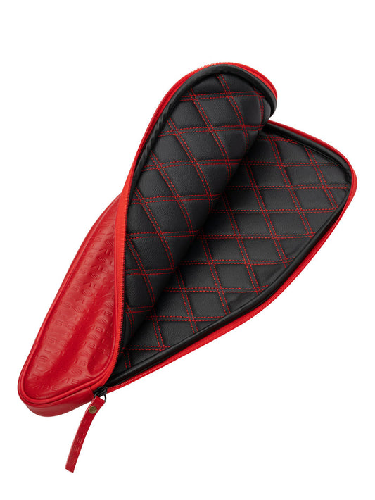 Red zippered padded sleeve open to show black quilted interior with red diamond stitching
