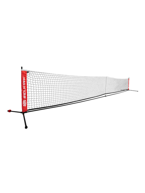 Portable collapsible pickleball net with black mesh and red end posts branded SELKIRK