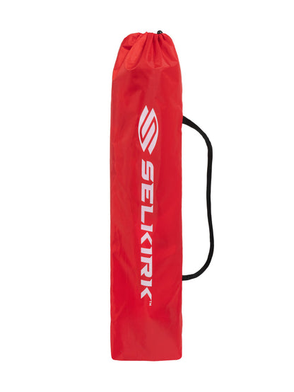 Red drawstring paddle bag with black shoulder strap and white vertical SELKIRK logo