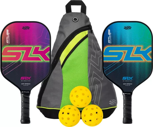 Two SLK paddles (ATLAS GRAPHITE; SLK BY SELKIRK; USAPA APPROVED), gray-green sling backpack with 3 yellow pickleball balls
