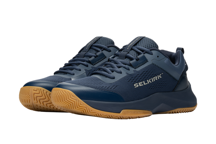 Navy mesh athletic sneakers with gum rubber soles and side logo 'SELKIRK'.