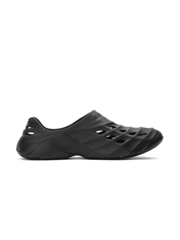 Side view of Selkirk Sport Renew Pickleball Recovery Shoe showing black molded EVA slip on with ventilation cutouts
