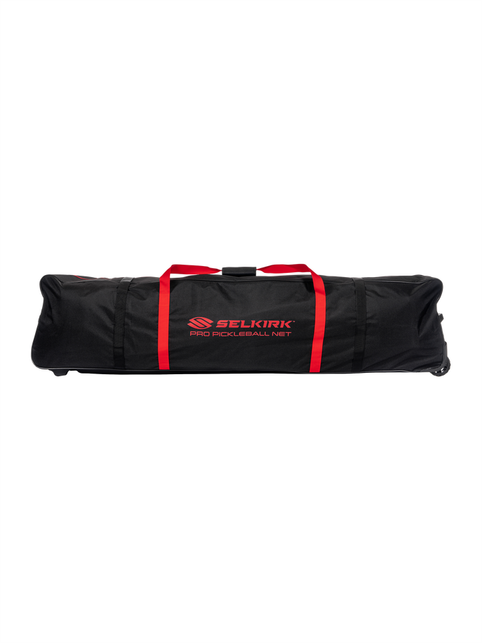 Black Selkirk carrying bag with red straps labeled SELKIRK PRO PICKLEBALL NET.