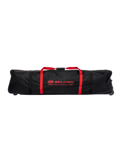 Black Selkirk carrying bag with red straps labeled SELKIRK PRO PICKLEBALL NET.