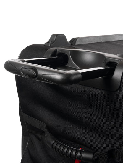 Telescoping suitcase handle with molded cup holder and textured black fabric exterior