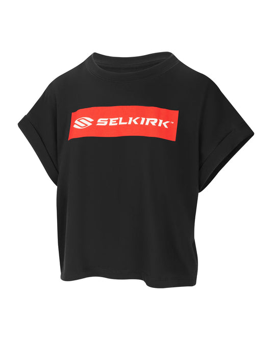 Black cropped T-shirt with red rectangular logo reading SELKIRK TM centered on the chest