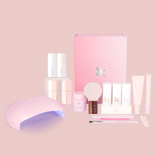 Sheer & Neutral Gel System with six sheer neutral gel polishes, nail tools, and a curing lamp for at home manicures