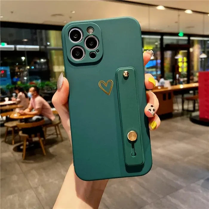 a person holding a green phone case