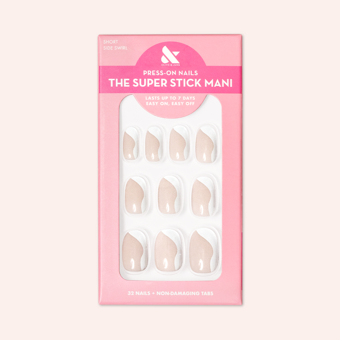 Side Swirl | Short | Round - Tab Press-On featuring neutral pink nails with pastel side swirl design in packaging on light pink background