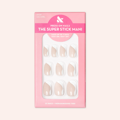 Side Swirl | Short | Round - Tab Press-On featuring neutral pink nails with pastel side swirl design in packaging on light pink background