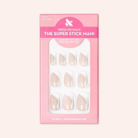 Side Swirl | Short | Round - Tab Press-On featuring neutral pink nails with pastel side swirl design in packaging on light pink background