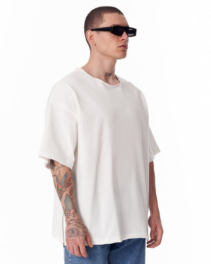 Martin Valen oversized white Sidezip crew-neck T-shirt with raw-edge neckline, three-quarter right view